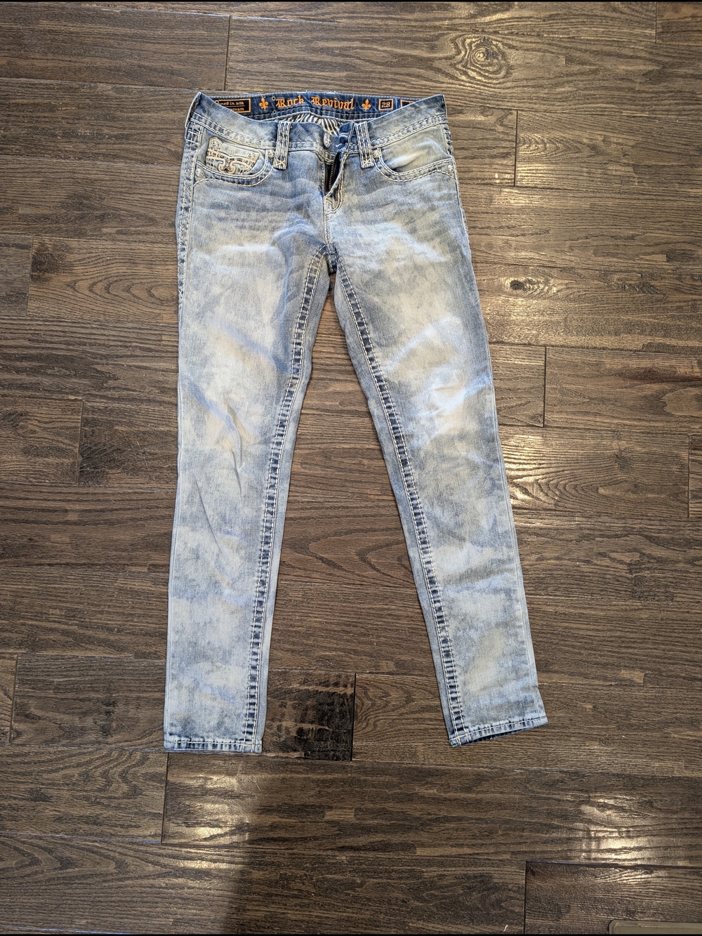 Rock Revival Light Wash Distressed Denim Jeans with Embroidered Waistband